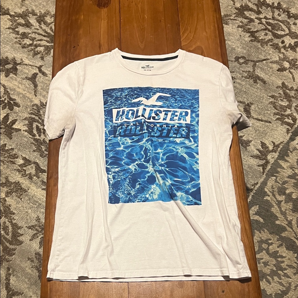 Hollister White Tee with Vibrant Blue Graphic